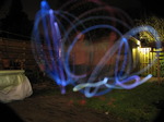 SX11042 Jenni demonstrating diy glowin in the dark poi in the back garden.jpg